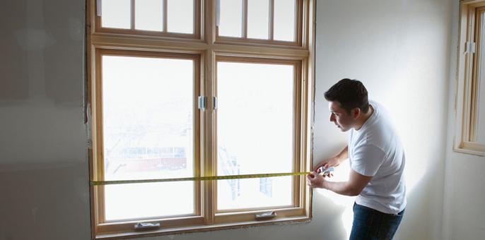 Removing a window to get sofa in Leicester